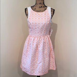 Jessica Simpson coral and white dress.